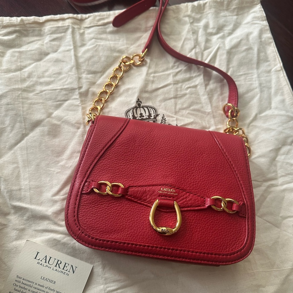 Ralph Lauren purse in red with a long belt/ chain . Brand new with tags